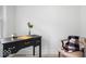 Home office with desk, chair, and bright natural lighting at 450 Pleasant St, Noblesville, IN 46060