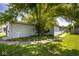 Exterior shot with light gray vinyl siding and sidewalk at 4625 N Sadlier Dr, Indianapolis, IN 46226