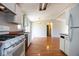 Open kitchen area with a vintage light fixture at 4625 N Sadlier Dr, Indianapolis, IN 46226