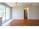 Eat-in kitchen featuring light wood floors, and a sliding glass door at 4625 N Sadlier Dr, Indianapolis, IN 46226