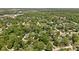 An aerial perspective highlights the lush tree cover and scattered homes, blending suburban comfort with nature's tranquility at 469 Ash Dr, Carmel, IN 46032