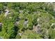 A high aerial shot of a neighborhood filled with mature trees and well-spaced houses at 469 Ash Dr, Carmel, IN 46032