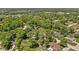 Expansive aerial view of the neighborhood with lush green trees and well-maintained homes at 469 Ash Dr, Carmel, IN 46032