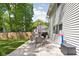 Spacious backyard with a table set and grill perfect for outdoor entertaining at 469 Ash Dr, Carmel, IN 46032