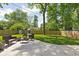 Great backyard featuring a relaxing patio area, seating and a wooden fence at 469 Ash Dr, Carmel, IN 46032