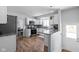 Bright kitchen features stainless steel appliances, granite countertops, and stylish tile backsplash at 469 Ash Dr, Carmel, IN 46032