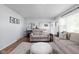 Comfortable living room with stylish rug, neutral walls and furniture, creating a welcoming atmosphere at 469 Ash Dr, Carmel, IN 46032