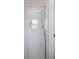 A glass shower door showcasing the sleek shower head in an updated bathroom at 469 Ash Dr, Carmel, IN 46032