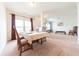 Inviting dining room with a set table and neutral decor at 4712 Clairmont Dr, Columbus, IN 47203