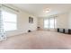 Well-lit living room with large windows and neutral color palette at 4712 Clairmont Dr, Columbus, IN 47203