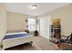 Comfortable bedroom with a bed, window, and closet offering a relaxing space at 4824 Eagles Watch Ln, Indianapolis, IN 46254