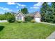 Well maintained lawn and landscaping highlight this beautiful single-story home and attached garage at 4824 Eagles Watch Ln, Indianapolis, IN 46254