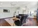 Open-concept living room with vaulted ceilings and hardwood floors at 4824 Eagles Watch Ln, Indianapolis, IN 46254