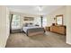 Spacious main bedroom with neutral colors and large windows at 4824 Eagles Watch Ln, Indianapolis, IN 46254