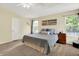 Comfortable main bedroom with soft lighting and carpeted floors at 4824 Eagles Watch Ln, Indianapolis, IN 46254