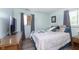 Cozy bedroom with a comfortable bed, soft lighting, and relaxing decor at 4967 Diana Dr, Indianapolis, IN 46203