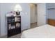Quiet bedroom space with view to laundry room at 4967 Diana Dr, Indianapolis, IN 46203
