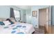 Bright bedroom with a closet, soft bed linens, and closet at 4967 Diana Dr, Indianapolis, IN 46203