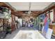 Spacious garage with wooden frame, ample storage, and potential for workshop or parking space at 4967 Diana Dr, Indianapolis, IN 46203