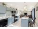 Open-concept kitchen flowing into the living area, featuring an island and modern appliances at 4967 Diana Dr, Indianapolis, IN 46203