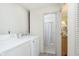 Well-equipped laundry room with modern washer and dryer units at 4967 Diana Dr, Indianapolis, IN 46203