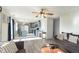 Spacious living room and kitchen with stylish wood floors and ample natural light at 4967 Diana Dr, Indianapolis, IN 46203