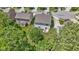 Birds eye view showcasing the home with a patio dining set and expansive backyard at 5145 Greenside Dr, Indianapolis, IN 46235