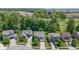Neighborhood aerial view showcasing multiple homes, green spaces, and residential layout at 5145 Greenside Dr, Indianapolis, IN 46235