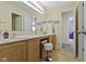 Bright bathroom offers a double sink vanity and plenty of natural light at 5145 Greenside Dr, Indianapolis, IN 46235