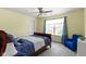 Cozy bedroom with a chair by the window and a comfortable, inviting space at 5145 Greenside Dr, Indianapolis, IN 46235
