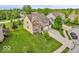 Attractive two-story home with a three-car garage and lush green lawn in a Gathering-friendly neighborhood at 532 Amersham Ct, Avon, IN 46123