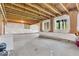 Unfinished basement featuring concrete flooring, exposed ceiling and wrapped walls with windows at 532 Amersham Ct, Avon, IN 46123