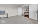 Spacious bedroom with neutral carpet and doors leading to connecting room at 532 Amersham Ct, Avon, IN 46123