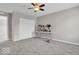 This bedroom features neutral walls, a ceiling fan, carpeted floors and a large closet at 532 Amersham Ct, Avon, IN 46123