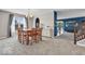 Elegant dining room featuring a wooden table, seating for six, and a view to other living spaces at 532 Amersham Ct, Avon, IN 46123
