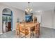 Bright dining room featuring a chandelier and wood table with chairs at 532 Amersham Ct, Avon, IN 46123