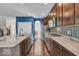 Modern kitchen featuring granite countertops, stainless appliances, and hardwood floors at 532 Amersham Ct, Avon, IN 46123