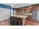 Modern kitchen featuring stainless steel appliances and large island with seating at 532 Amersham Ct, Avon, IN 46123
