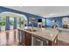 Open-concept kitchen featuring granite countertops, stainless steel appliances, and hardwood flooring at 532 Amersham Ct, Avon, IN 46123