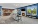 Open living room with fireplace flowing into a modern kitchen at 532 Amersham Ct, Avon, IN 46123