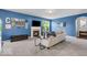 Cozy living room with blue walls, fireplace, and comfortable seating at 532 Amersham Ct, Avon, IN 46123