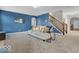 Comfortable living room with a staircase and hardwood flooring at 532 Amersham Ct, Avon, IN 46123