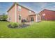 Expansive backyard with a patio area ideal for outdoor dining and entertainment at 548 Gosford Ct, Westfield, IN 46074