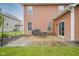 Spacious backyard featuring a stone patio with outdoor seating, perfect for entertaining at 548 Gosford Ct, Westfield, IN 46074