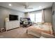 Comfortable bedroom with a large window, carpet, and modern amenities at 548 Gosford Ct, Westfield, IN 46074