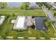 Aerial view of a community pool, featuring ample lounge seating and a parking lot at 548 Gosford Ct, Westfield, IN 46074