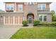 Beautiful two-story home with brick and vinyl siding, attached garage, and well-manicured landscaping at 548 Gosford Ct, Westfield, IN 46074