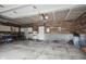 Spacious garage with storage cabinets, durable floor, and ample space for vehicles at 548 Gosford Ct, Westfield, IN 46074