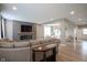 Open living space with wood floors, neutral color palette, and seamless flow to the dining and entry areas at 548 Gosford Ct, Westfield, IN 46074