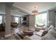 Spacious living room showcasing wood floors, ample seating, and a modern fireplace feature at 548 Gosford Ct, Westfield, IN 46074
